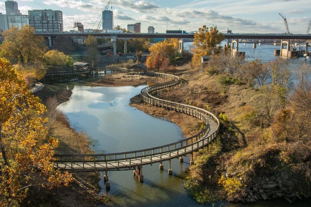 Little Rock downtown seen over the _Bill_ Clark Wetlands located in the Clinton Presidential Park, Arkansas, USA