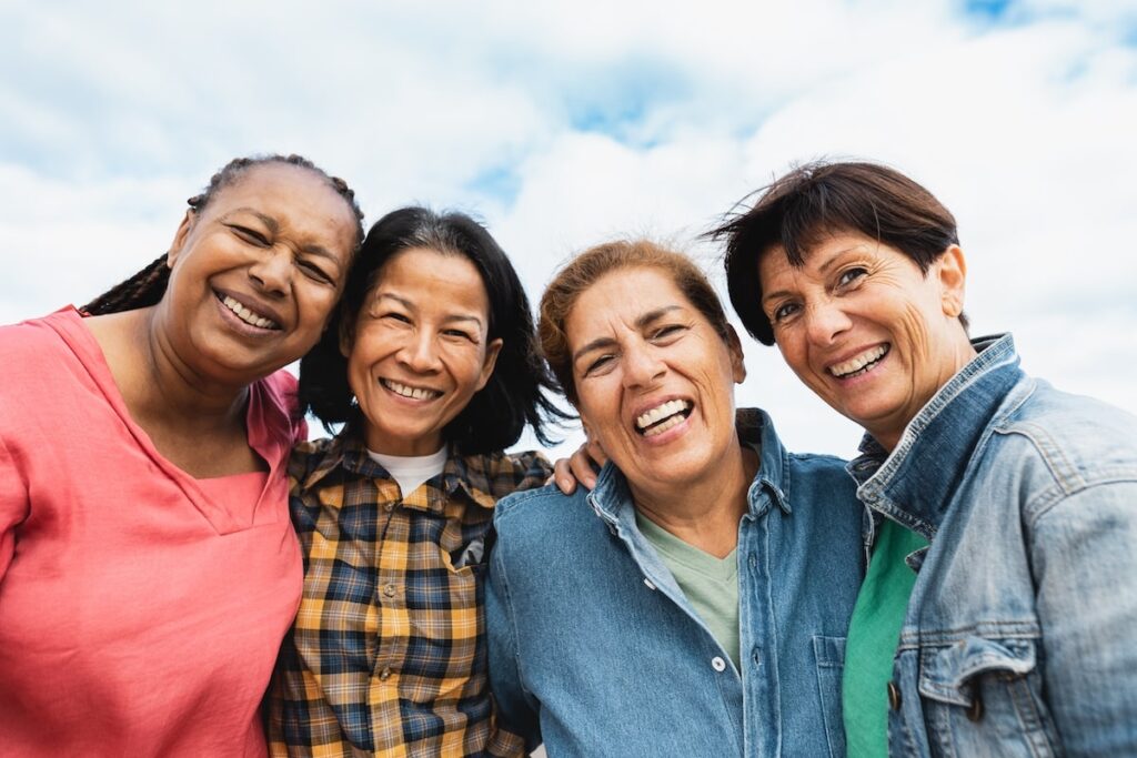 A group of friends in a senior living setting